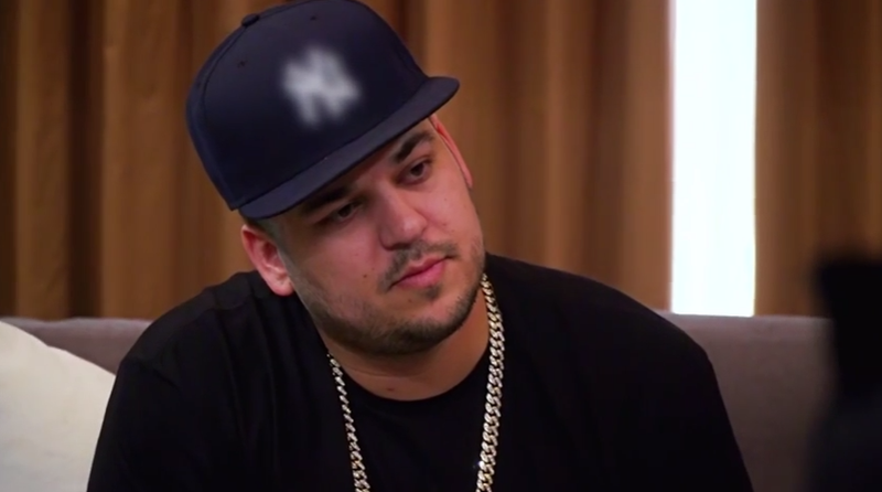 Illustration for article titled Rob Kardashian's Kiss-and-Make-Up With His Sisters Was More Than a Little Staged